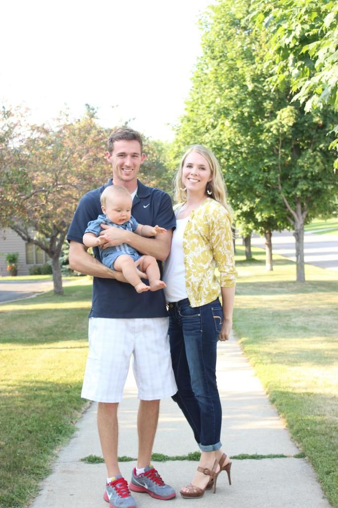 a family on a sidewalk